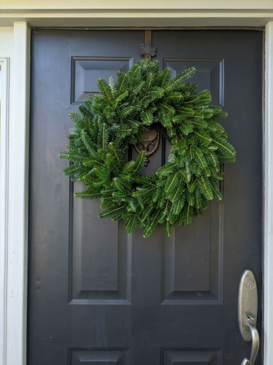 24-inch Fraser fir wreath on a front door